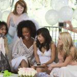 Bride celebrating with friends at bridal shower