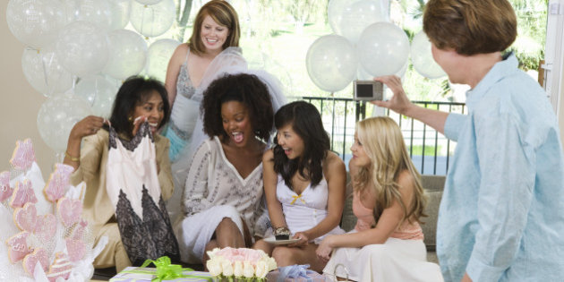 Bride celebrating with friends at bridal shower