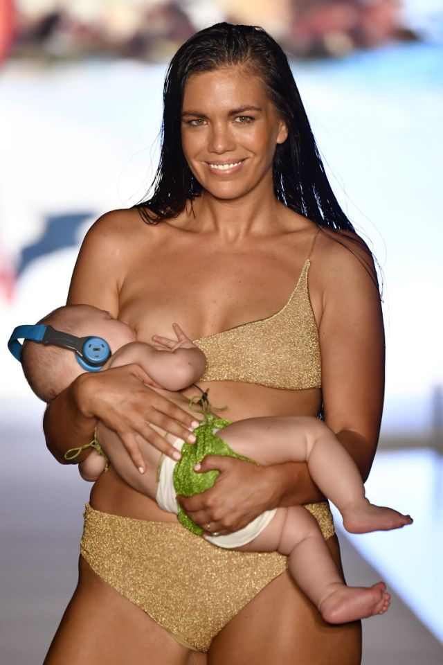 Model trends for breastfeeding baby while strutting the runway