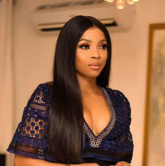 Over zealous Fan covers up Toke Makinwa promo picture